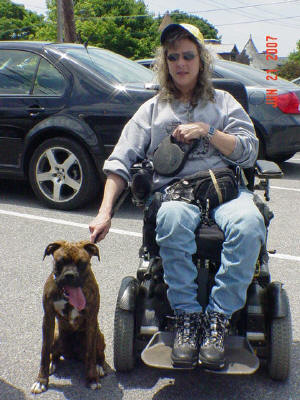 BUCHANANFPC PHOTO (BARBARA ROOK AND HER SERVICE DOG, THE BOXER)